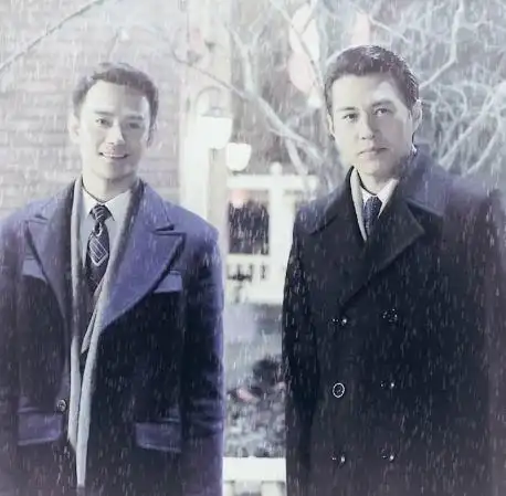 图明诚伪装者角色分析身世凄苦勇谋兼具睿智伪装