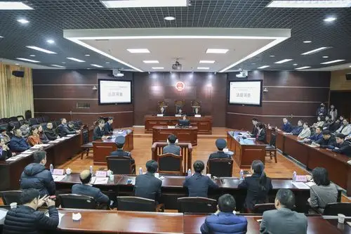 模拟庭审后,集美区人民检察院李翼检察官,集美区人民法院张显春法官