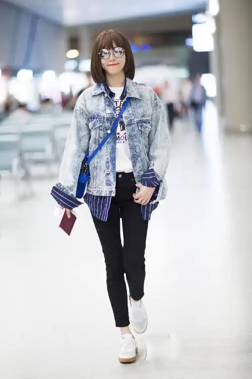 唐嫣图片:机场短发唐嫣有点酷