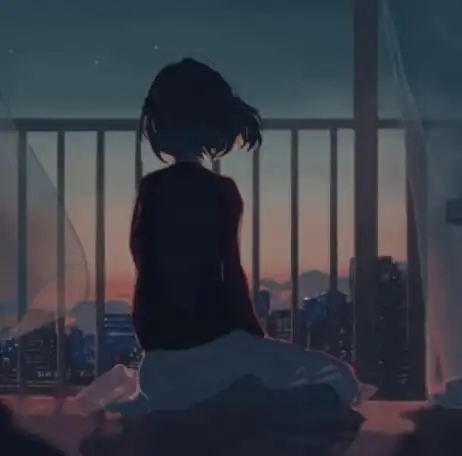 夜晚独自一人坐在窗前图片,一个人孤独坐在夜晚的窗前图片