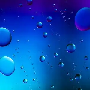 水滴光谱的梯度的蓝色的海洋的紫色绿色的颜色彩虹多彩珠饰 lotus