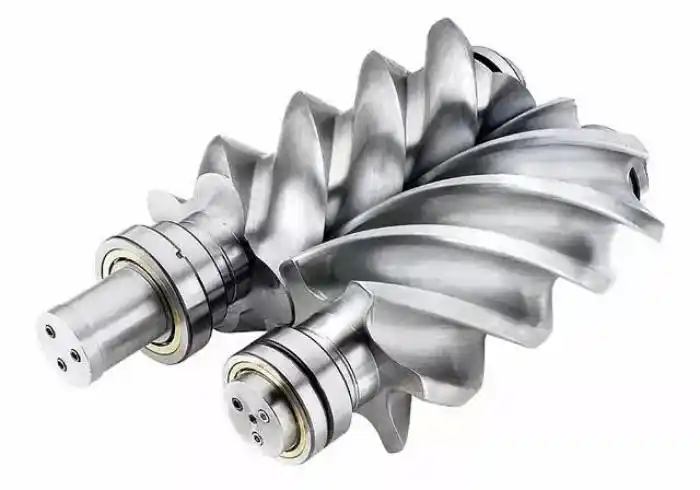 双螺杆式压缩机的原理是通过两根啮合的金属螺杆,将气体导入一个越来