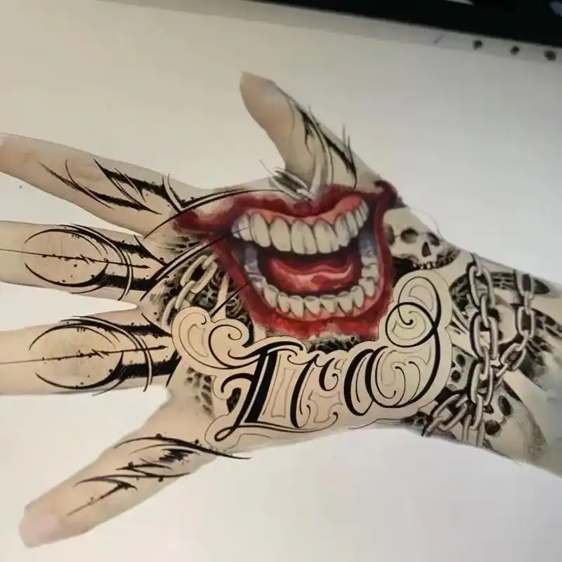 手背纹身设计.爆手背小丑经典嘴元素手指花体字是七宗罪的首 - 抖音