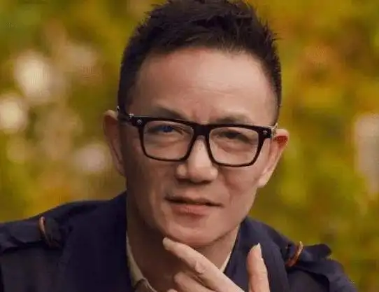 上海前首富周正毅到底是什么人?