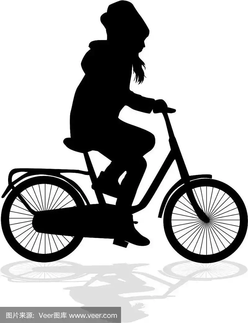 一个骑自行车的孩子的剪影.
