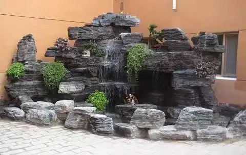 滨州小区小型水泥假山瀑布流水施工厂家 假山瀑布施工注意的问题