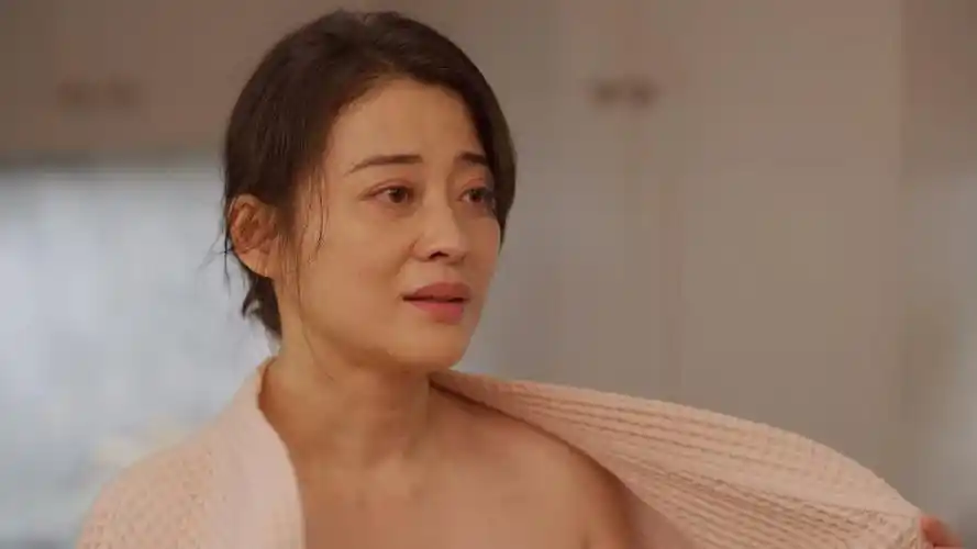 饰演付心童的梅婷