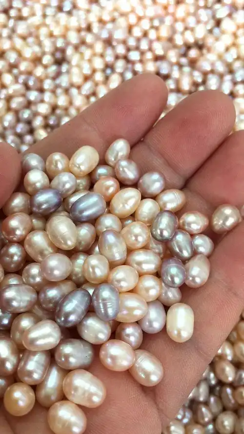 新款然丽淡水珍珠 6一7散珠强光椭圆工艺原料大量自家养殖珠散珠