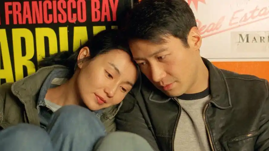 计算机上一直都贴着张曼玉的泳装照,后来两人因为拍摄《甜蜜蜜》成为