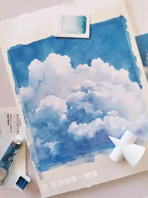 颜料整整齐齐排好然后用木浆纸试用画了一张天空打算明天再画一张颜料