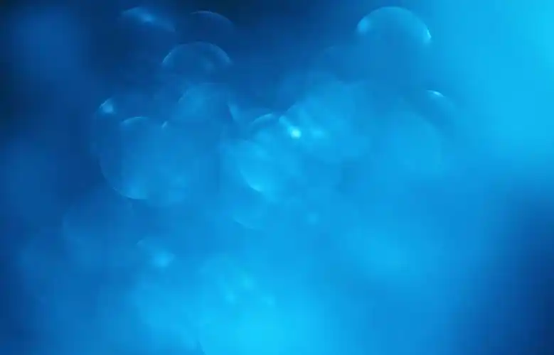 蓝色光斑模糊背景高清图片