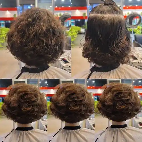 女人过了65 岁,发型就选短发纹理烫,特别显气质