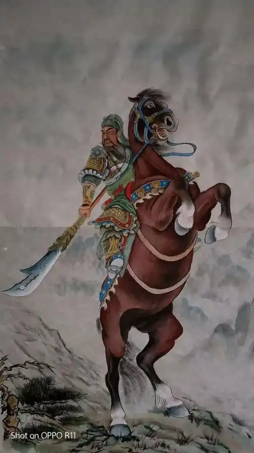 关公立马横刀啸,义重威武抒豪情.