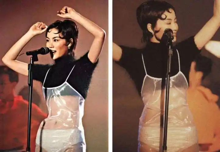 理应搭配大长腿加轻盈亮闪闪的高跟鞋,而王菲却搭配了酒红色的丝袜和