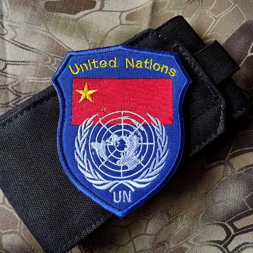 维和臂章刺绣魔术贴章联合国蓝盔徽章户外包衣服贴战术士气章订做-mc