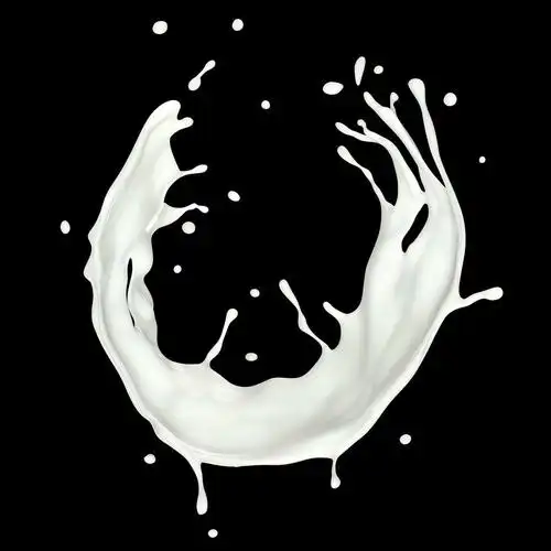 牛奶溅,在黑色背景上分离的牛奶飞溅.