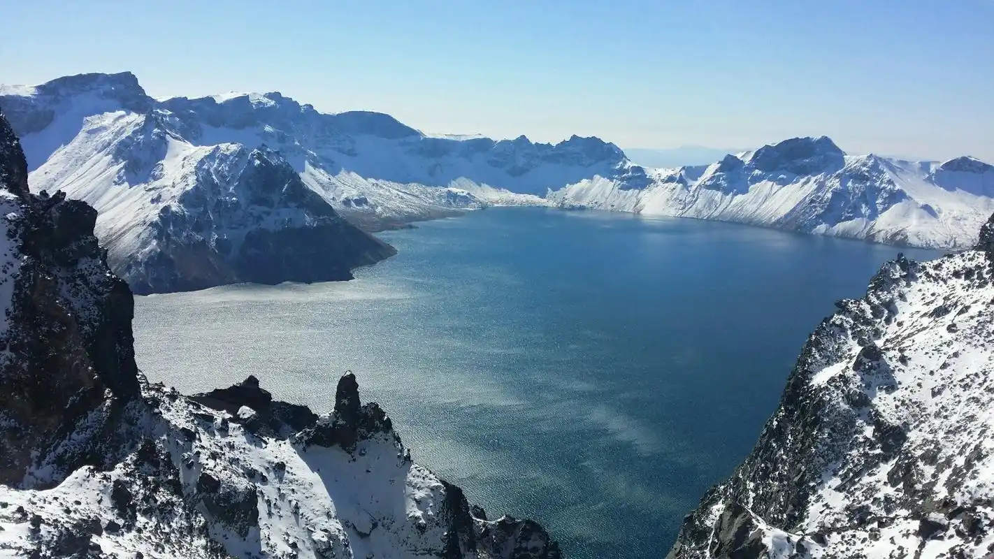 你在南方的艳阳里高照我在长白山的白雪里飘摇