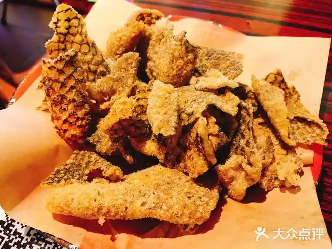 沙胆彪炭炉牛杂煲(北京路店)炸鱼皮图片