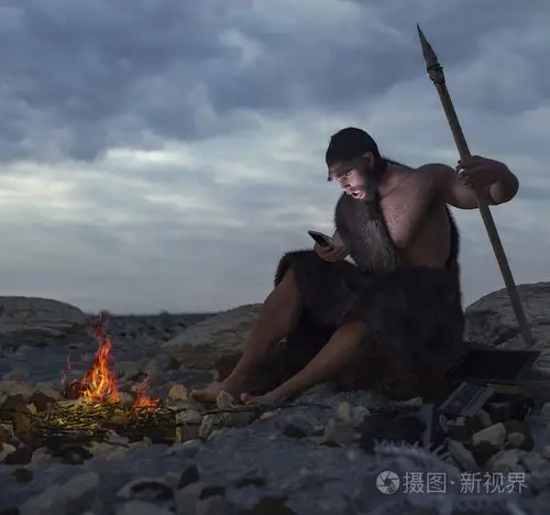 选址在智能手机概念图与石头上的原始人