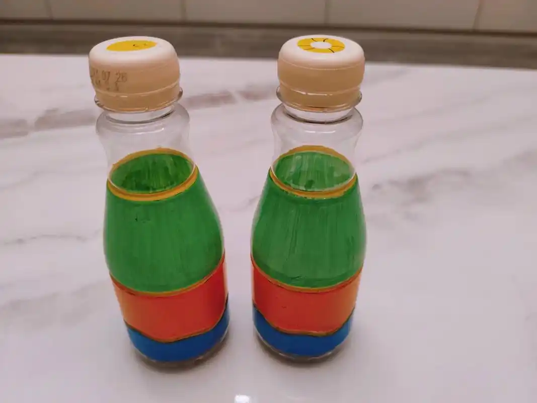 幼儿园作业自制乐器(废物利用) diy沙锤 用雀巢咖啡瓶做小沙锤 幼儿园