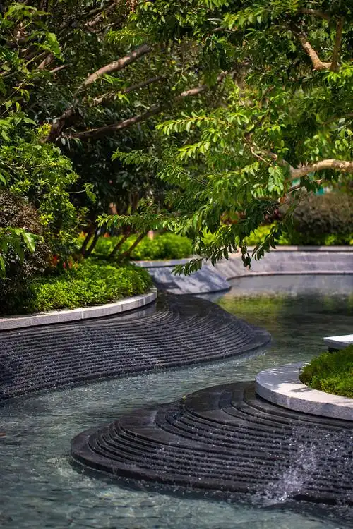珠海卓越唐家墅 展示区 现代禅意 水景 蜿蜒溪流 树池 跌水 景观设计