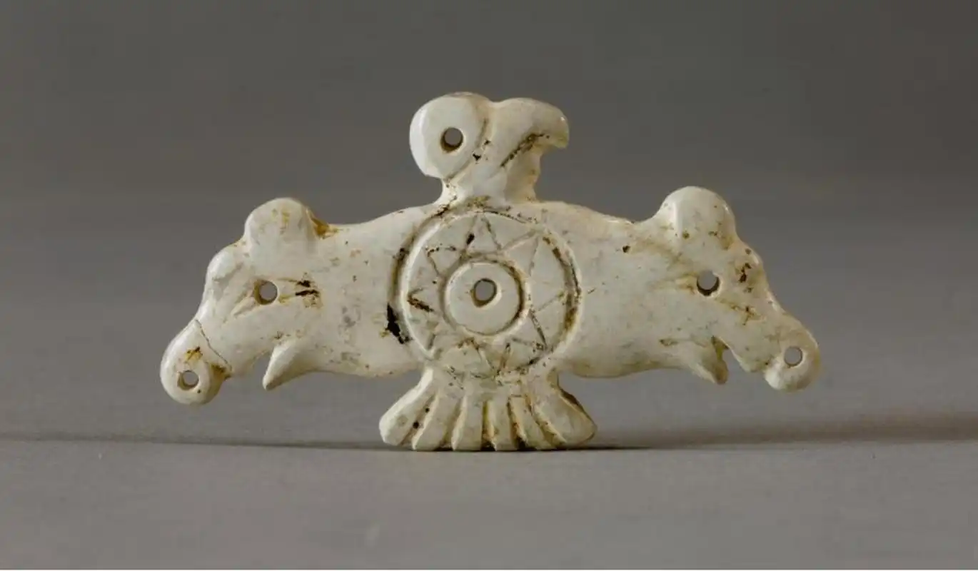 神秘的凌家滩玉鹰,关于猪头和八芒星就先不说了,你的脖子为啥往左拐?