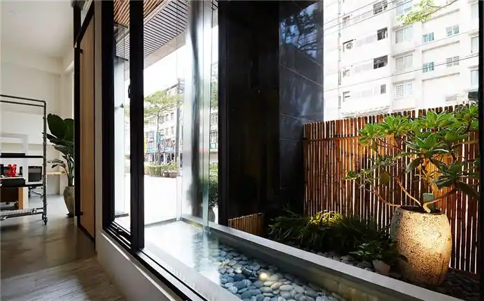 100平loft极简风办公室装修改造室内水景设计案例