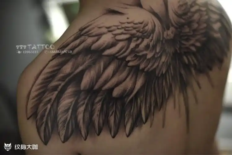 翅膀作品_背部欧美写实纹身图案大全 - 纹身大咖