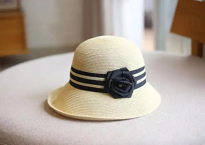 法国轻奢帽子女春夏草帽时尚卷边防晒出游盆帽花朵渔夫帽宽檐休闲圆顶