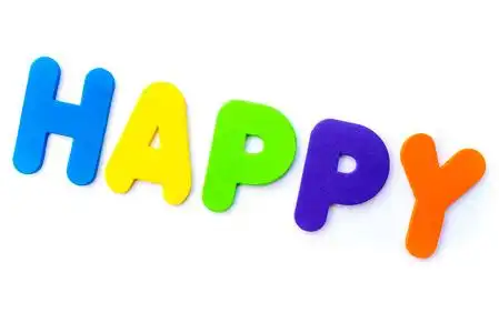 一个普通的白色背景下的快乐字照片