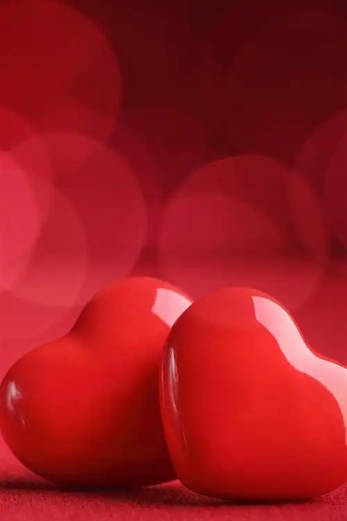 两颗红色的爱心,浪漫,朦胧 iphone 壁纸