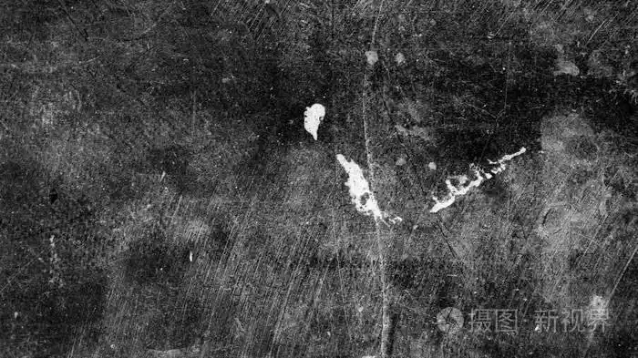 带划痕的旧黑暗表面的照片