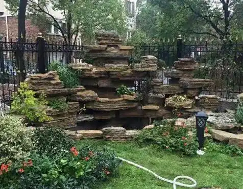别墅庭院千层石假山制作