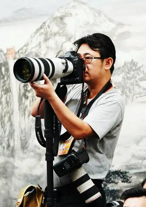 优秀的新闻图片融合了新闻性与艺术性 新闻摄影师杜洋  我参加工作