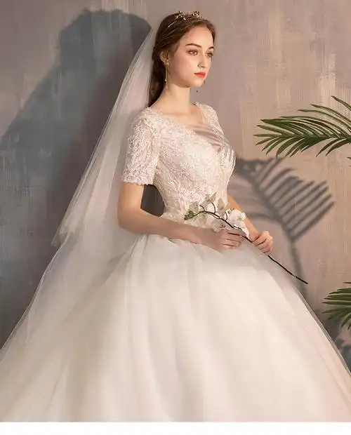 拖尾婚纱女2021新款新娘奢华显瘦结婚v领抖音出门纱梦幻主纱赫本