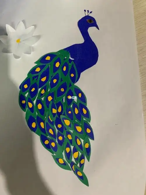 一次课堂作业写的剪纸拼贴画,羽毛再舒展些可能会更好.