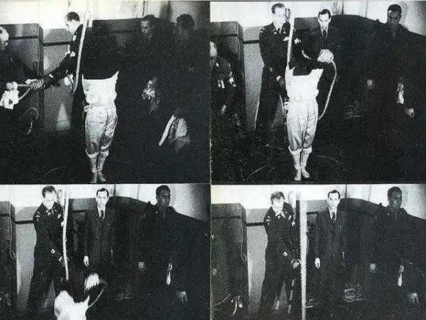 在确认他们已经彻底断气后,士兵们把这4名甲级战犯的尸体从绞刑台上卸