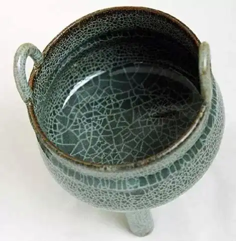 再谈南宋龙泉溪口窑墨绿釉黑胎瓷器.