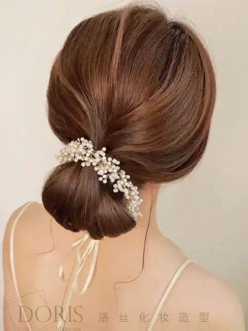 新娘造型低发髻一款新娘通用的气质盘发