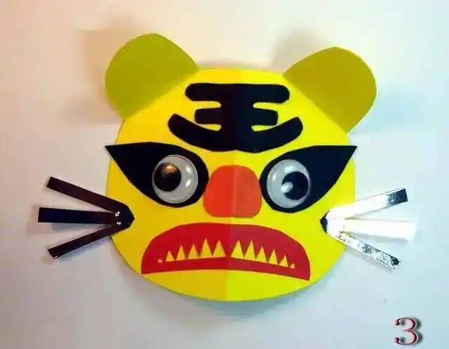 折纸剪纸区 创意纸浮雕老虎头饰的制作图