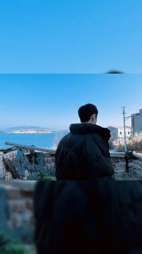 张艺兴看海背影照