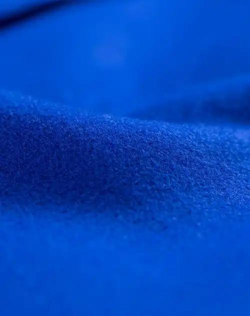 宝蓝色立领双排扣小o型长袖毛呢大衣