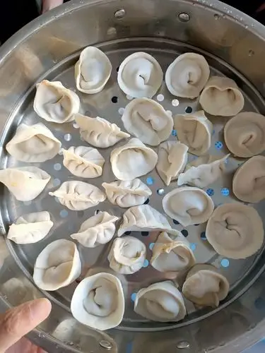 民俗文化课上,我们学习包饺子