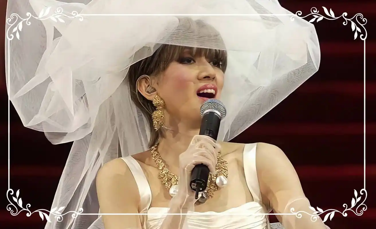 梅艳芳告别演唱会经典婚纱造型,图片来自网络作者: editorial staff