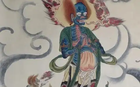 的塑像上身裸露,红发獠牙,手拿镇妖铃,狰狞凶恶,整个一副夜叉鬼模样