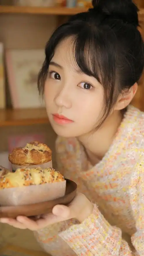 丸子头美女清纯俏皮高清手机壁纸