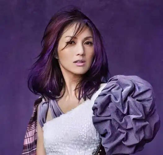 原创46岁杨千嬅罕露面与陈奕迅险成恋人嫁小5岁志明很幸福