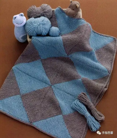全手工棒针编织的童毯