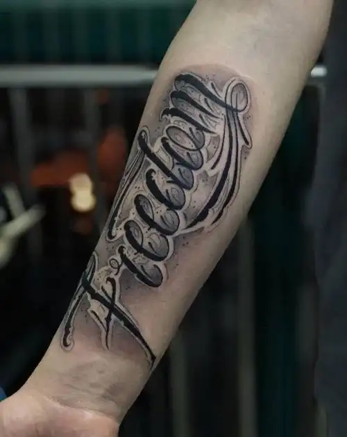 花体字纹身图片_手臂纹身图案
