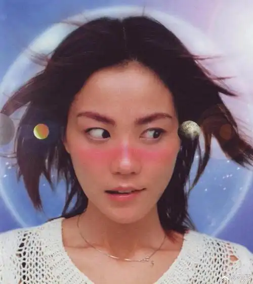 全世界90年代都在展望2000年的千禧年    图片为王菲在1998年发行的名